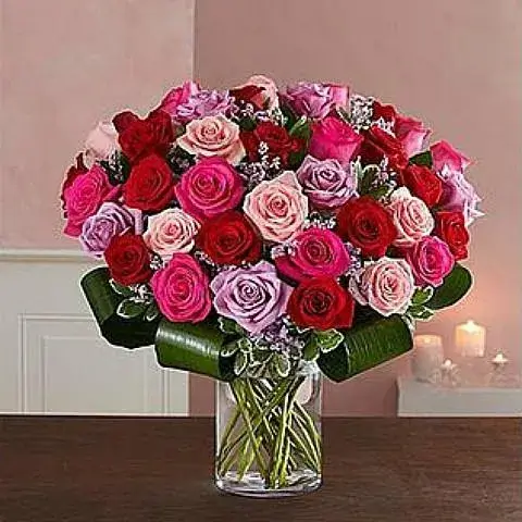 Buy 59 mixed red pink and purple roses bouquet from Athens flower shop for same day delivery.